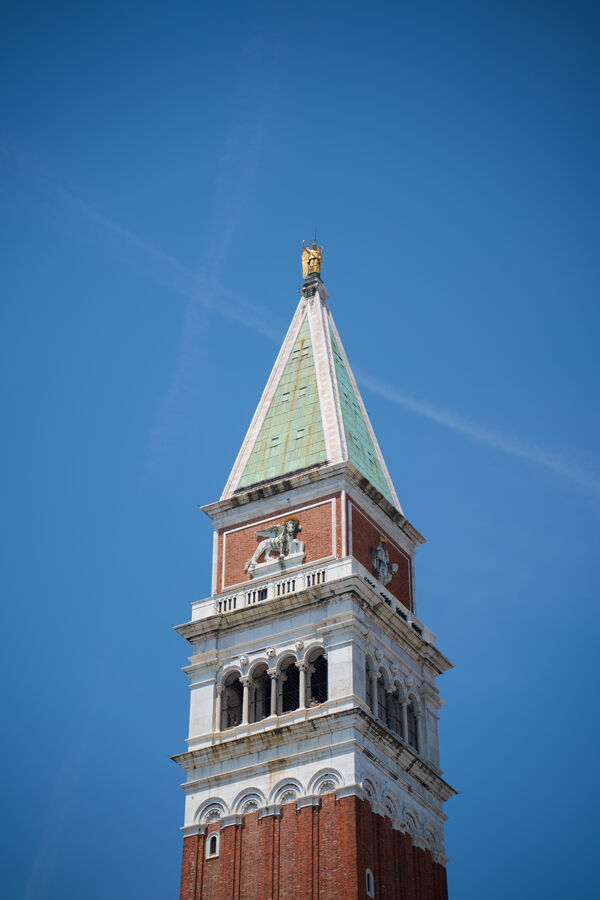 The campanile of St Mark's in Venice against a cloudless sky